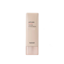 Load image into Gallery viewer, HEIMISH Artless Glow Tinted Cream Shine Beige is a multi-functional tinted cream that combines hydration, sun protection, and a natural glow. Formulated with Niacinamide for brightening and Adenosine for anti-aging care, it evens out skin tone while delivering a radiant, dewy finish. Enriched with Pearl Extract and botanical ingredients like Rosa Canina Fruit Extract and Thyme Leaf Extract, it nourishes and soothes the skin. Perfect for daily wear, this tinted cream provides lightweight coverage and a lumin