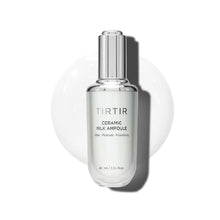 Load image into Gallery viewer, TIRTIR Ceramic Milk Ampoule is a deeply nourishing treatment designed to hydrate, soothe, and fortify your skin barrier. Formulated with key ingredients like Squalane, Ceramide, Cholesterol, Niacinamide, and Rice Extract, it delivers essential hydration, strengthens the skin barrier, and enhances overall skin health. The addition of Soybean Ferment Extract and Avocado Fruit Extract provides rich nutrients and moisture, leaving your skin soft, smooth, and glowing. Its lightweight, milky texture absorbs quick