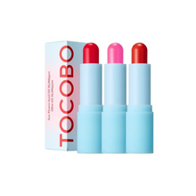 Load image into Gallery viewer, TOCOBO Glass Tinted Lip Balm is a vegan formula that combines hydration with a natural tint for beautifully nourished lips. Enriched with Sunflower Seed Oil, Olive Fruit Oil, and Jojoba Seed Oil, it provides deep moisture and a smooth, non-sticky finish. This tinted balm adds a subtle pop of color while keeping your lips soft, supple, and radiant throughout the day.